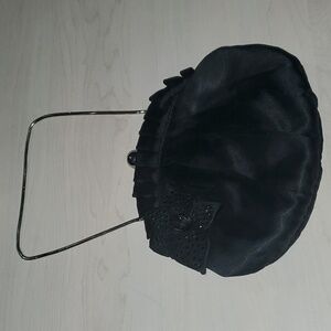 Black satin evening bag pleat clam closure silver clasp beaded floral adornment